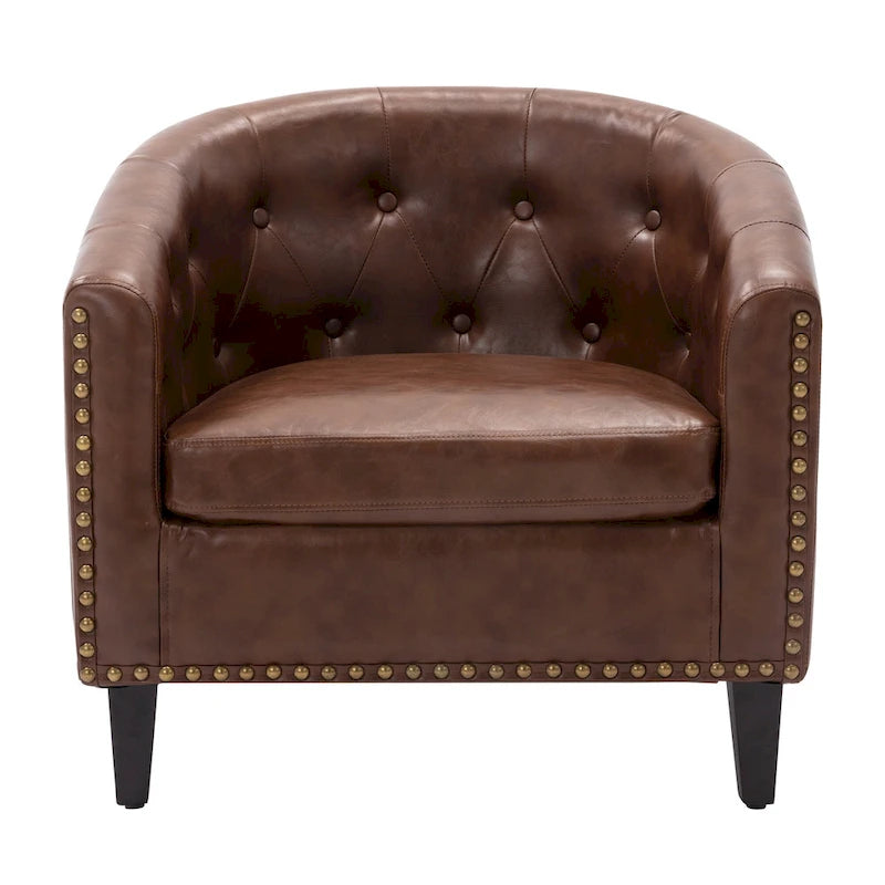 Fauteuil club en similicuir avec accoudoirs encastrés et garniture cloutée