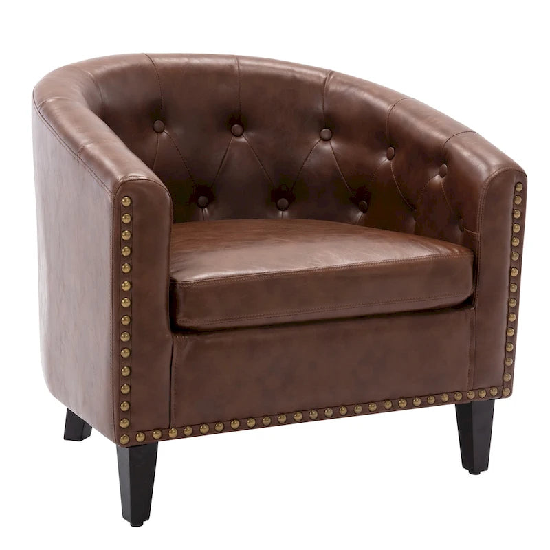 Fauteuil club en similicuir avec accoudoirs encastrés et garniture cloutée