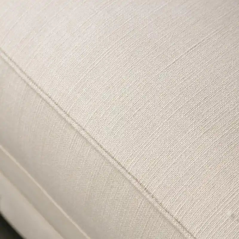 Canapé Glam beige en tissu avec capitonnage à boutons, clous décoratifs et mousse à mémoire de forme