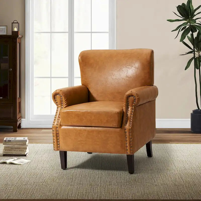 Fauteuil en cuir de transition avec clous décoratifs et accoudoirs roulés
