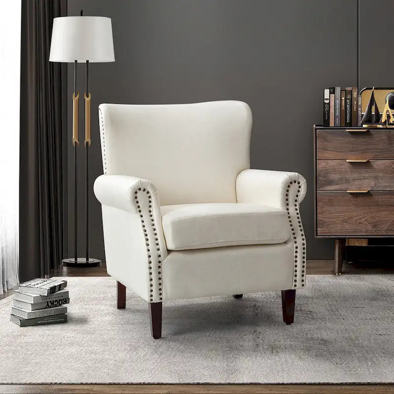 Fauteuil en cuir de transition avec clous décoratifs et accoudoirs roulés