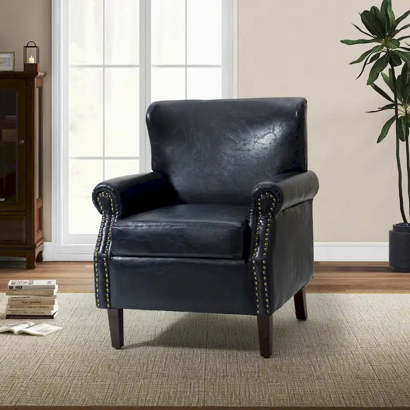 Fauteuil en cuir de transition avec clous décoratifs et accoudoirs roulés
