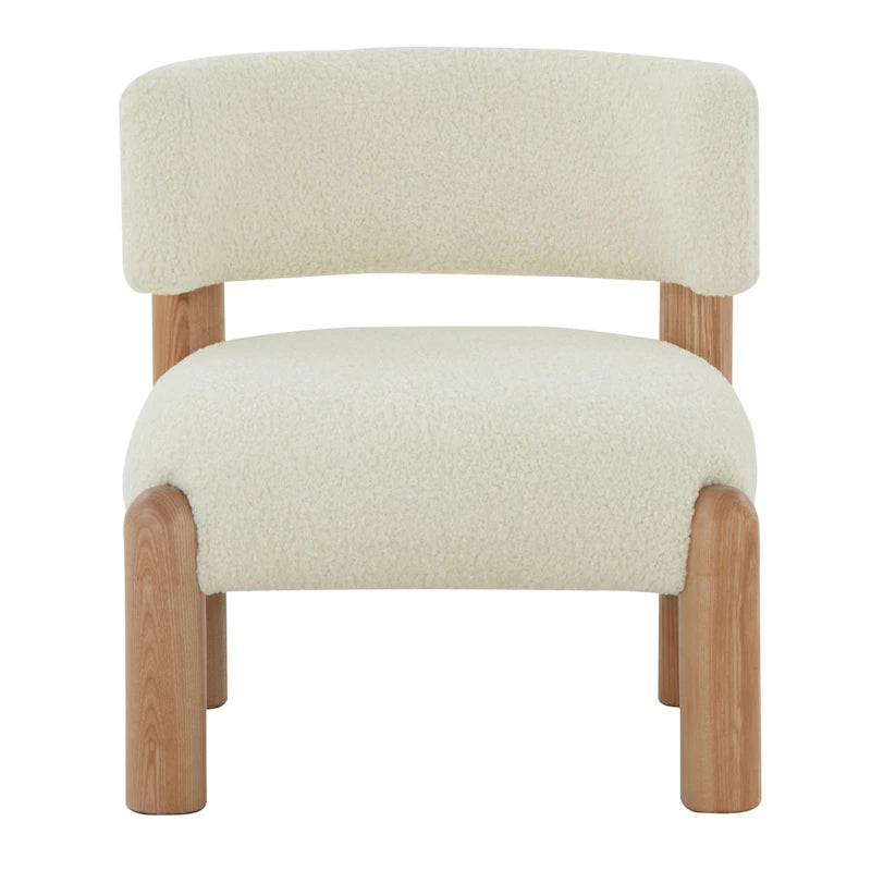 Fauteuil en fausse fourrure avec pieds sculptés en bois