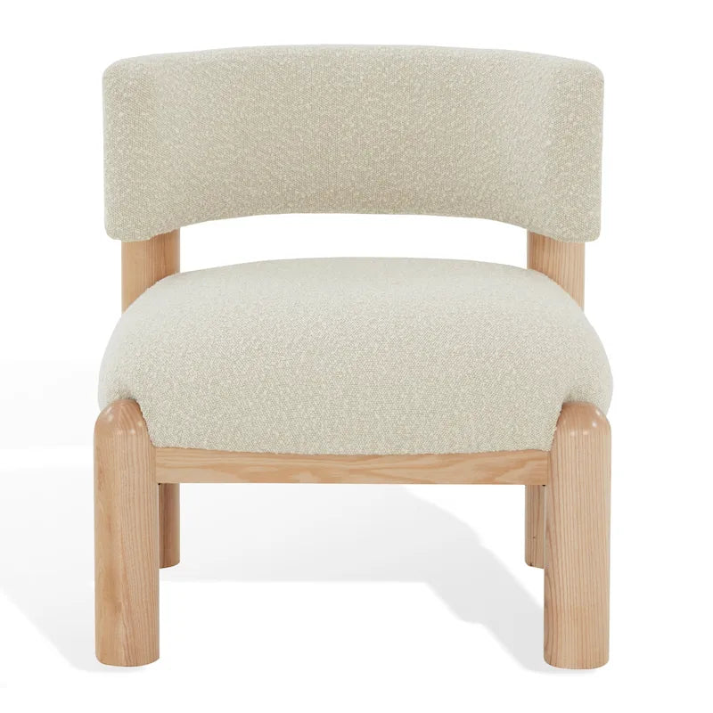 Fauteuil en fausse fourrure avec pieds sculptés en bois