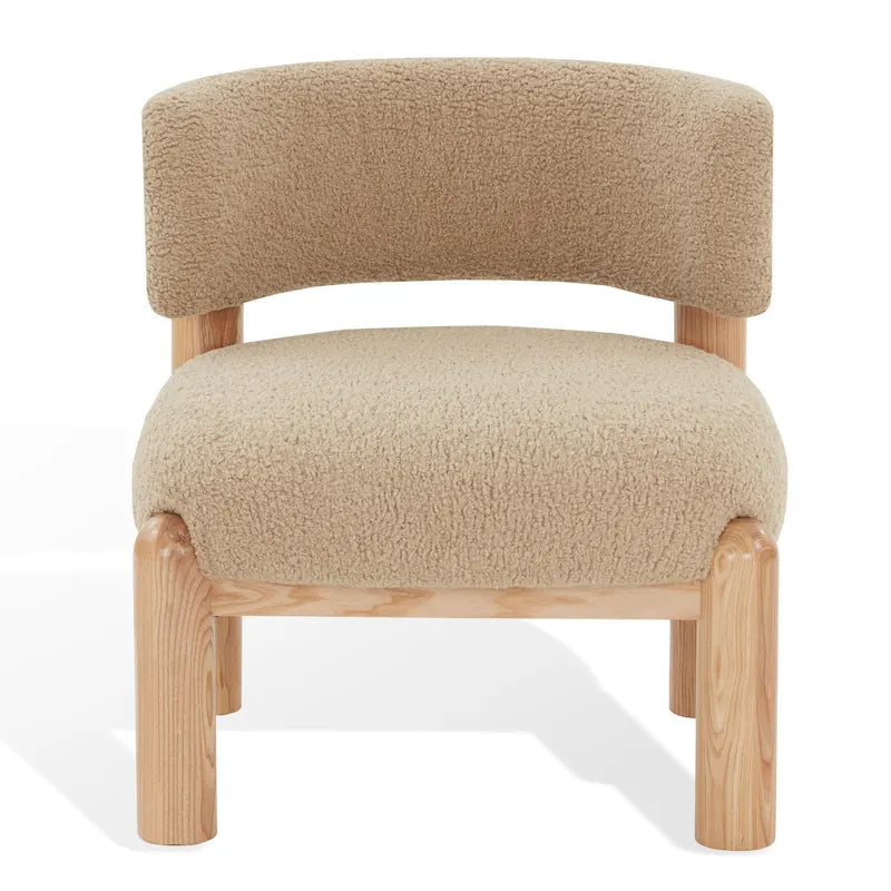 Fauteuil en fausse fourrure avec pieds sculptés en bois