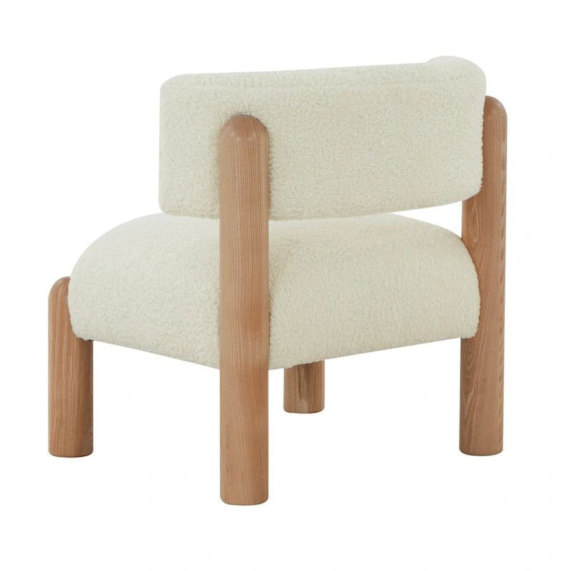Fauteuil en fausse fourrure avec pieds sculptés en bois