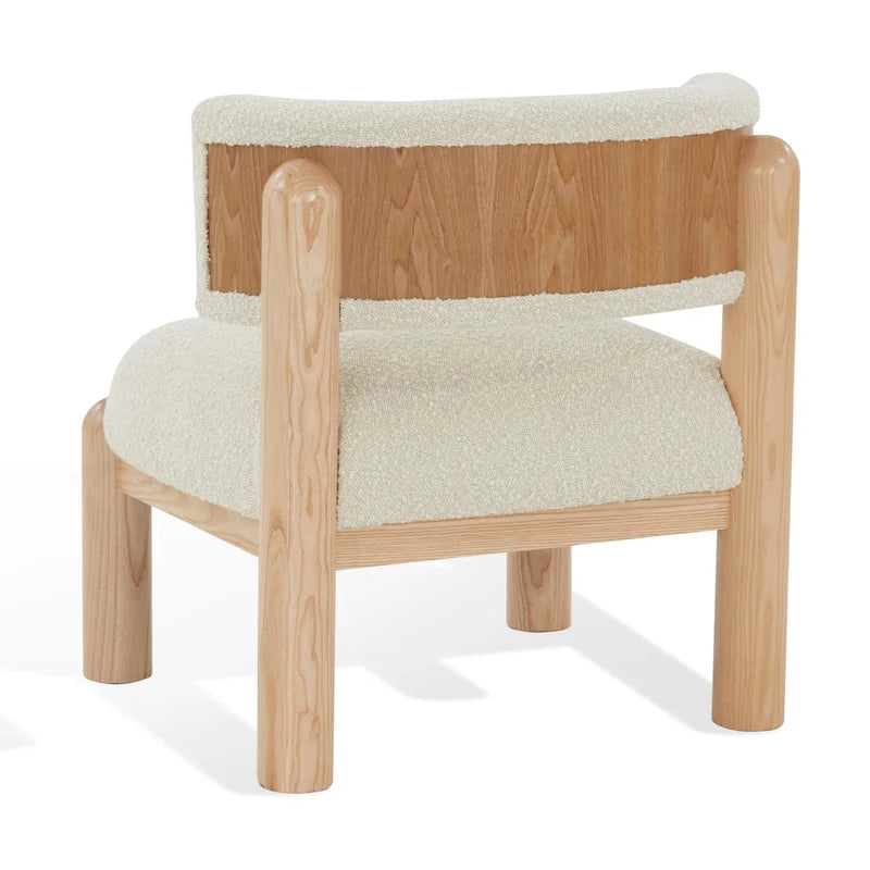 Fauteuil en fausse fourrure avec pieds sculptés en bois
